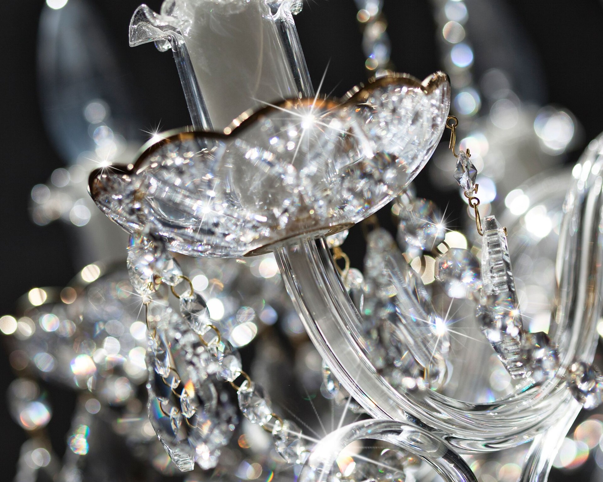 Cleaned Bohemian crystal chandelier — bobeche and drops at full brilliance The result: clean crystal breaks the light into sharp reflections again.