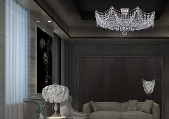 Table lamps and crystal chandelier in bedroom